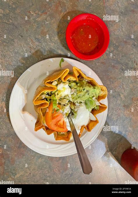 Nacho Tortilla Taco Salad Chips And Dip In A Red Bowl Top View Stock