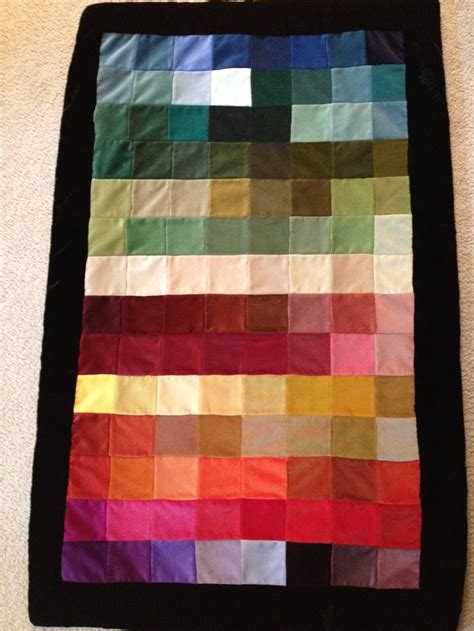 Patchwork Quilt Made From Velvet Fabric Sample Squares Put In Order