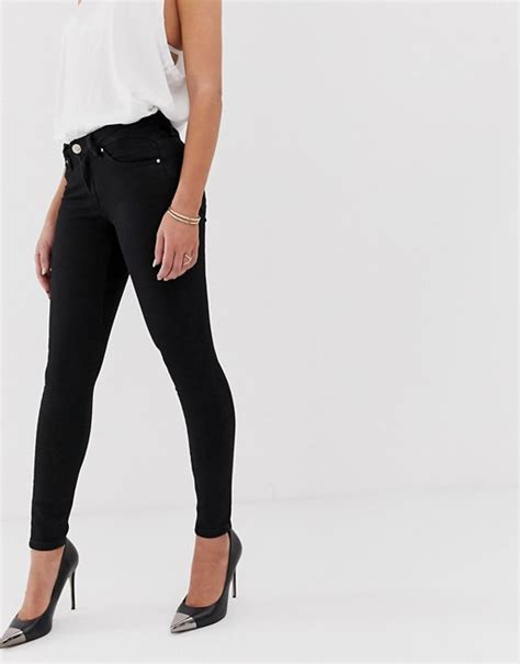 Asos Design Lisbon Mid Rise Skinny Jeans In Clean Black In Ankle Grazer