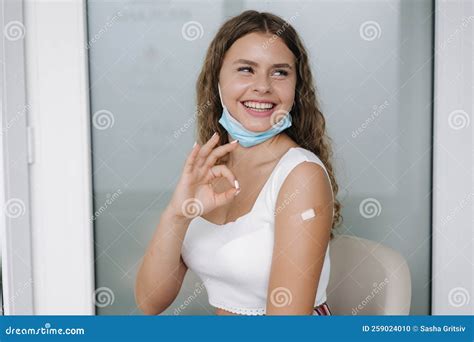 Portrait Of A Female Smiling After Getting Covid 19 Vaccine Woman