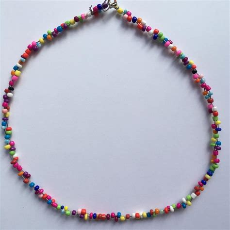 Bright Multi Coloured Twisted Beaded Necklace Depop