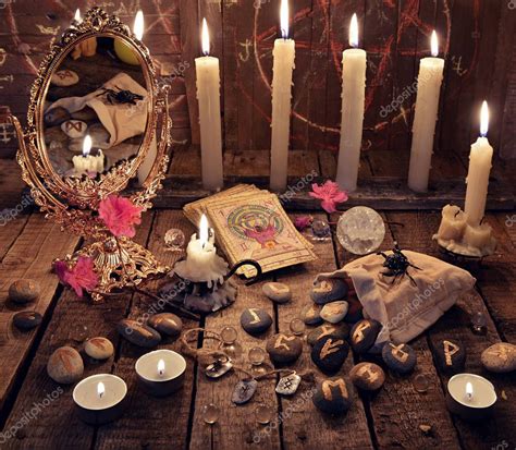 Mystic Ritual With Burning Candles Magic Mirror Flowers And The Tarot