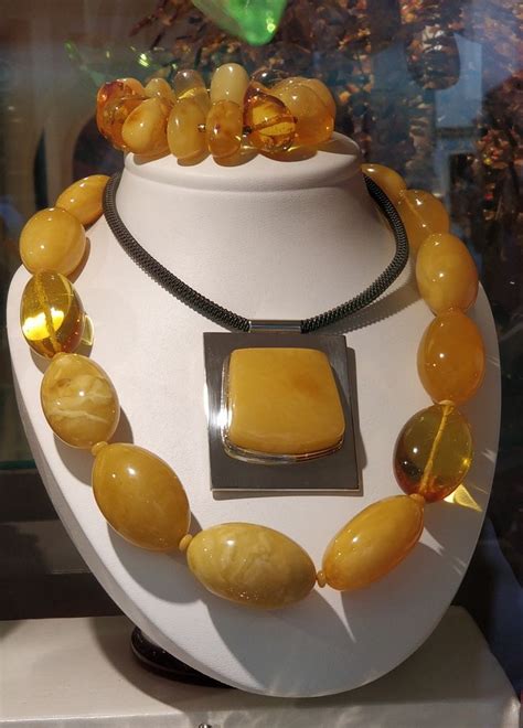 Amber - Poland | Amber jewelry, Silver necklace designs, Dramatic necklace