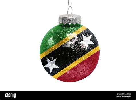 Glass Christmas ball toy isolated on white background with the flag of