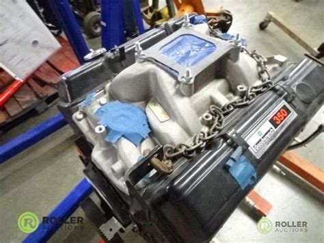 GM Goodwrench 350 Engine w/ Engine Stand - Roller Auctions