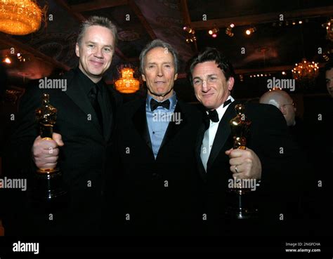 Oscar winners Tim Robbins, left, and Sean Penn, right, pose with ...