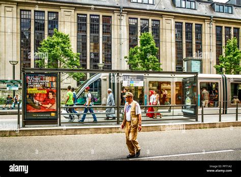 People and modern tram on the Langstross/Grand Rue at the Museum of ...