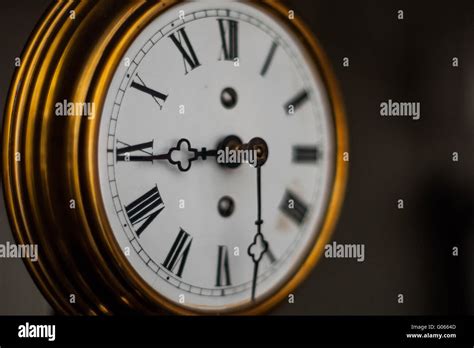 antique clock with roman numerals Stock Photo - Alamy