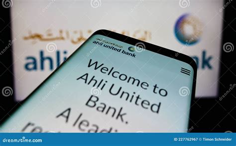 Cellphone With Webpage Of Bahraini Company Ahli United Bank Aub On