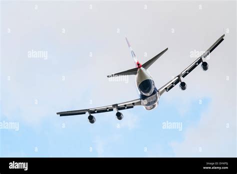 Rear view of a British Airways Boeing 747 Jumbo jet plane banking away ...