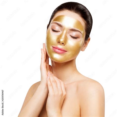 Woman Gold Mask Beautiful Model With Golden Skin Cosmetic Touch Face