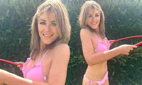 Elizabeth Hurley Flaunts Her Jaw Dropping Figure In A Tiny Pink Bikini Daily Mail Online