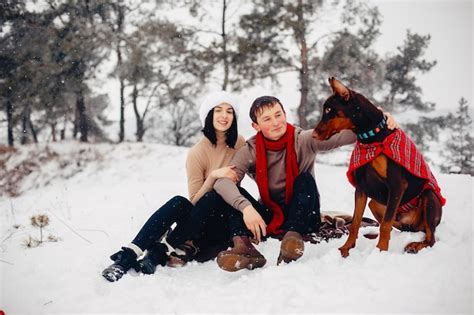 Free Photo | Loving couple walking in a winter park