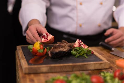 closeup of Chef hands preparing beef steak 12753775 Stock Photo at Vecteezy