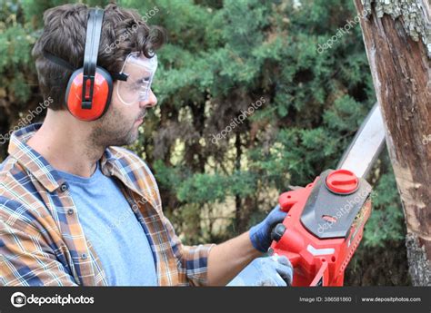 Man Cutting Tree Chainsaw Forest Stock Photo by ©albejor2002@hotmail ...