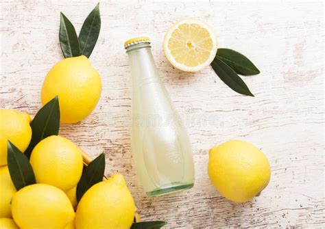 Glass Bottle Of Organic Fresh Lemon Juice Fruits Stock Photo Image Of