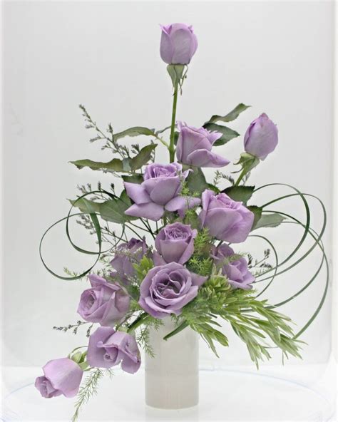 Blue Rose Arrangement | Rose flower arrangements, Purple flower ...