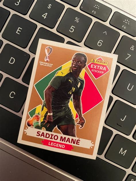 Figurinha Sadio Man Legend Extra Sticker Bronze Da Copa