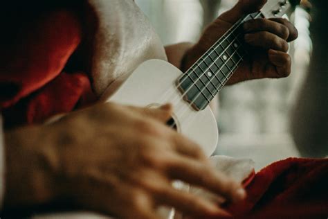 Person Playing A Ukulele · Free Stock Photo