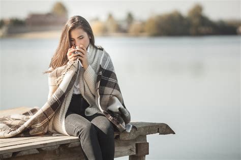 Premium Photo Attractive Woman Drinking Coffe Or Tea At The Pier Outdoors