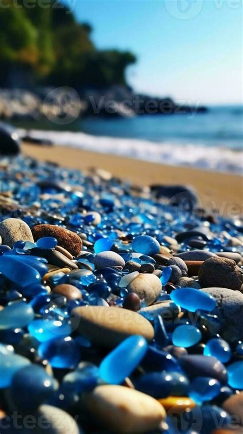 blue transparent pebbles on the beach. 24192532 Stock Photo at Vecteezy