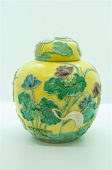 A Chinese Relief Decorated Ginger Jar And Cover Late Qing Dynasty In