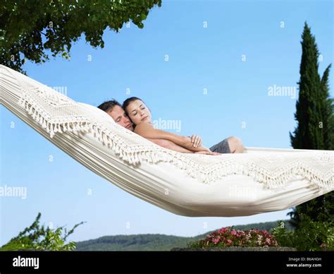 Couple Cuddling Hammock Hi Res Stock Photography And Images Alamy