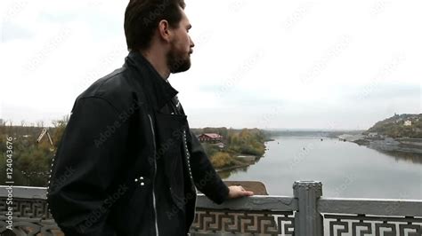 Handsome bearded man in black leather jackets Stock Video | Adobe Stock