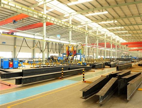 Hot DIP Galvanized Steel Welded H Beam Steel Building Structure With Sandwich Panel At Low