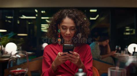 Girl Surfing Mobile Phone On Dinner Date Woman Sitting At Restaurant Table Stock Image Image