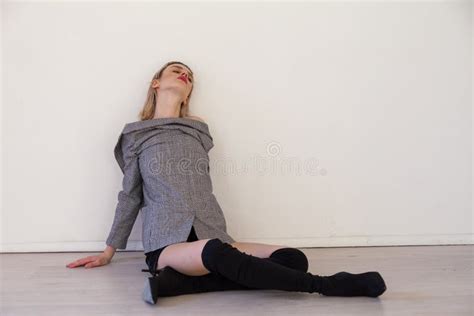 Portrait Of A Beautiful Fashionable Blonde Woman In Lingerie And Boots Stock Photo Image Of