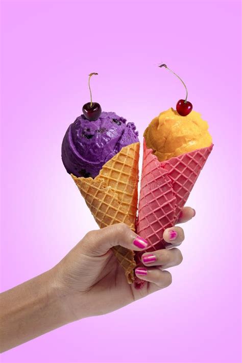 Woman S Hand Holding Blackcurrant and Mango Ice Cream Cone. Two Ice Cream Cone in Hand Stock ...