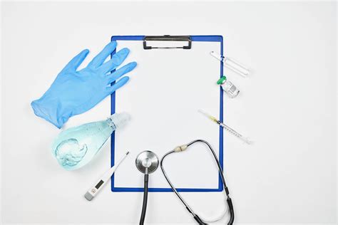 Clipboard With Copy Space Stethoscope Syringe Thermometer Glove