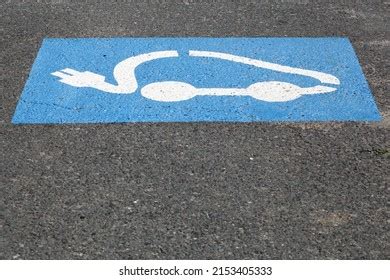 Electric Car Charging Symbol On Parking Stock Photo 2153405333 ...