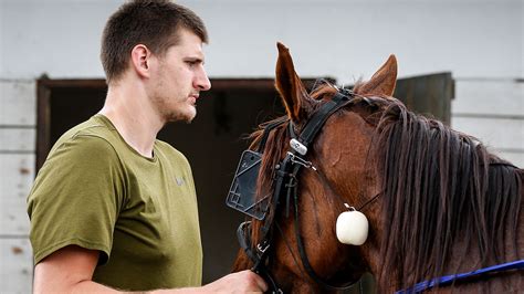 Nikola Jokic Watches Horse Videos On His Phone During Practice