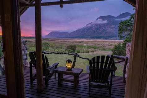 Cabin Lodge During Sunset Mountains And Grassland Near Hermanus At The