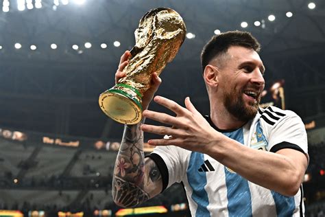 Messi Holding Fifa World Cup