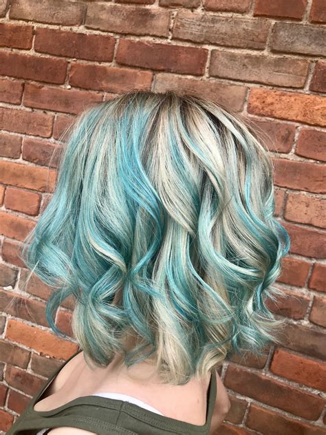 Platinum Blonde Hair With Ashy Shadow Root And Blue Highlights