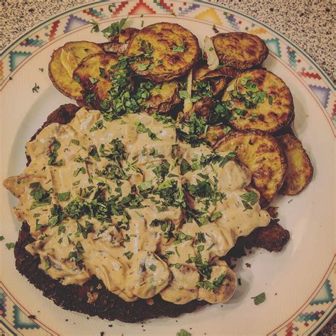 [homemade] Schnitzel With Creamy Mushroom Sauce And Baked Potato Chips Food