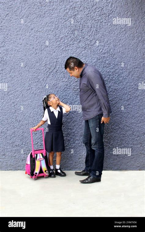 Divorced Single Dad Walks To School With His Year Old Brunette Daughter Carrying Her Backpack