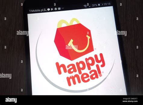 Mcdonald`s Happy Meal Logo Displayed On A Modern Smartphone Stock Photo