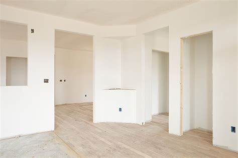 New Home Construction Drywall And Unfinished Floor Stock Photo