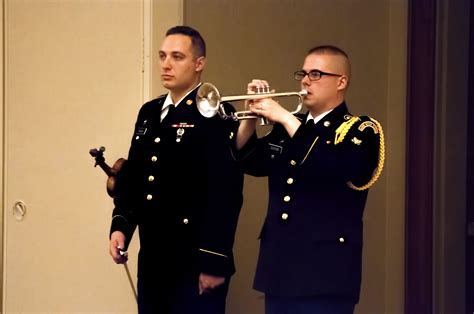 The Event Recognized The Fallen With The Traditional Military Bugle Taps