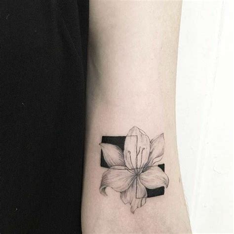 24 Symbolic Lily Tattoo Ideas Lily Tattoo Tattoos Popular Tattoos