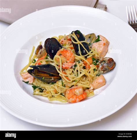 Fresh Pasta With Seafood And Herbs Stock Photo Alamy