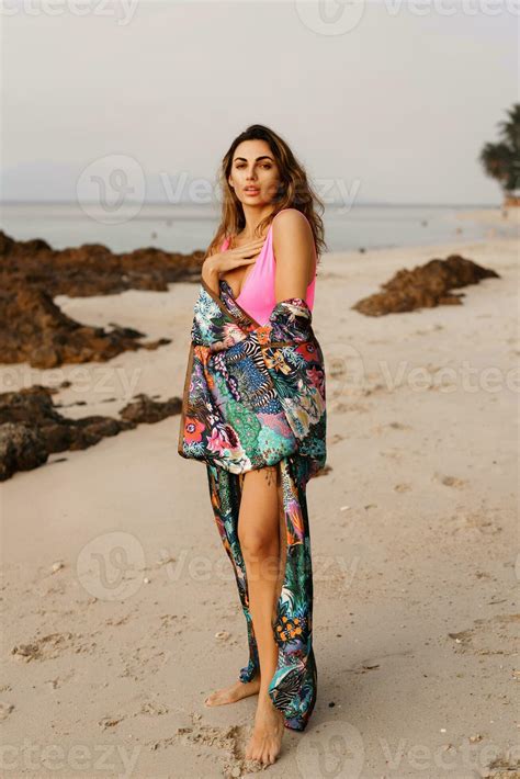 Outdoor Photo Of Cheerful Beautiful Brunette Woman In Sexy Pink