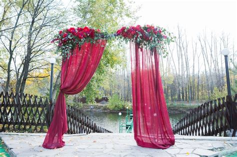 Premium Photo Arch For The Wedding Ceremony Decorated With Cloth