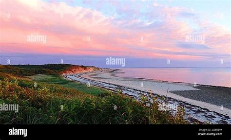 Cape cod beach at sunset, colorful Stock Photo - Alamy