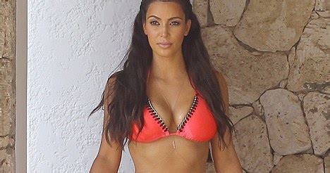 Kim Kardashian Shows Hourglass Figure In Orange Bikini Shrieking News