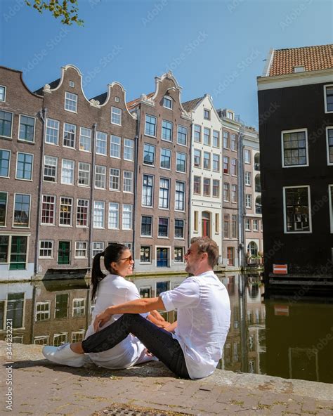 Amsterdam Netherlands, couple visit the city of Amsterdam during spring ...